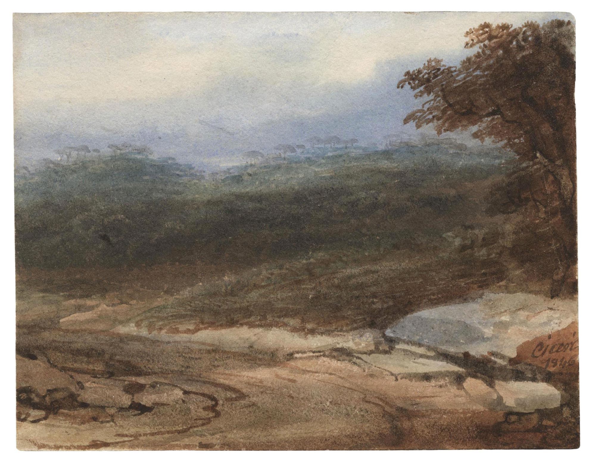 Chemin tournant devant une colline