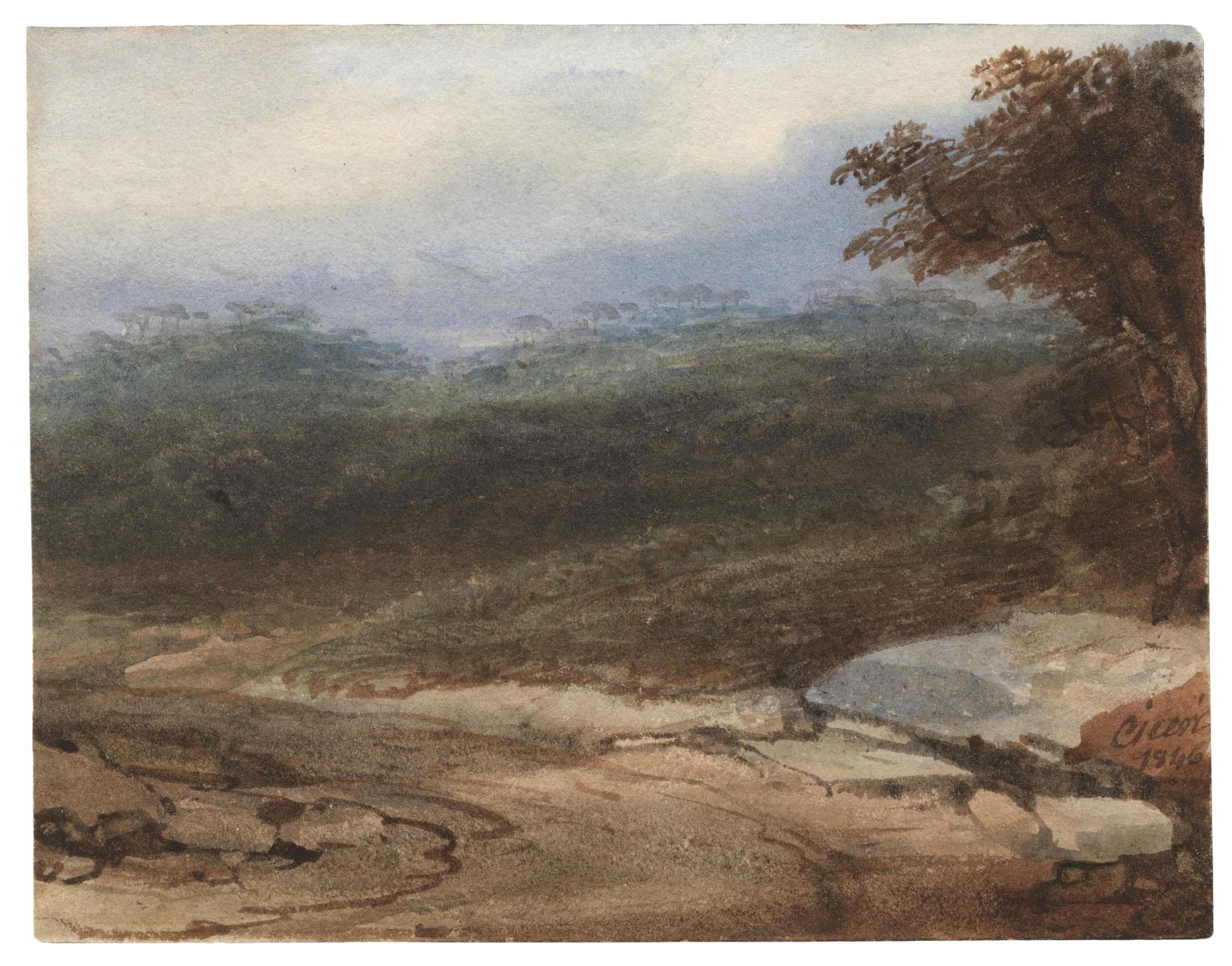 Chemin tournant devant une colline