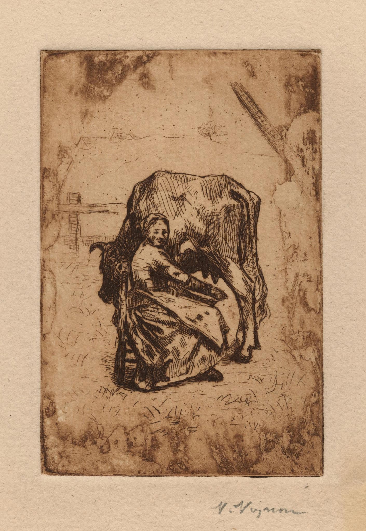 A farmer milking her cow