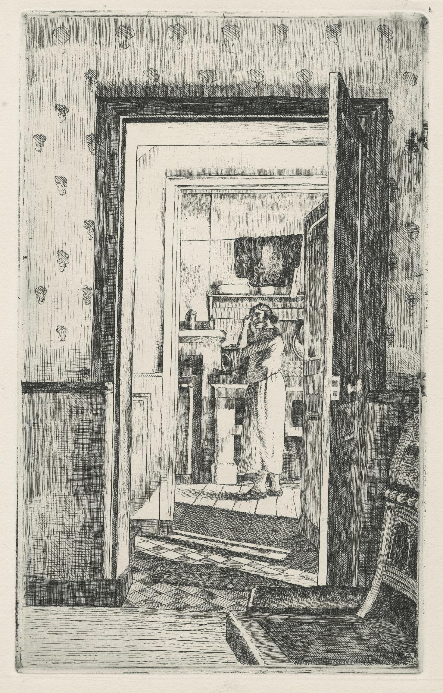 Porte ouverte donnant sur une cuisine