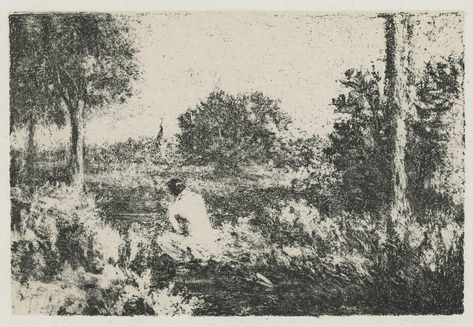 Jeune femme assise au bord d’une rivière en île de France