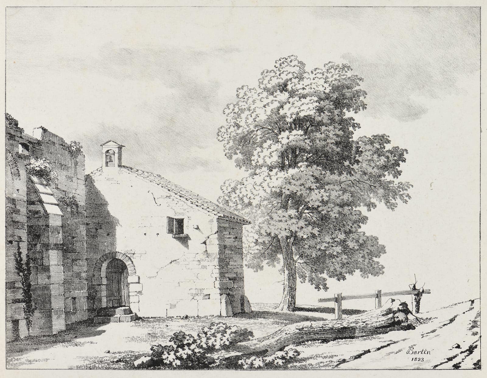 A chapel near a large tree