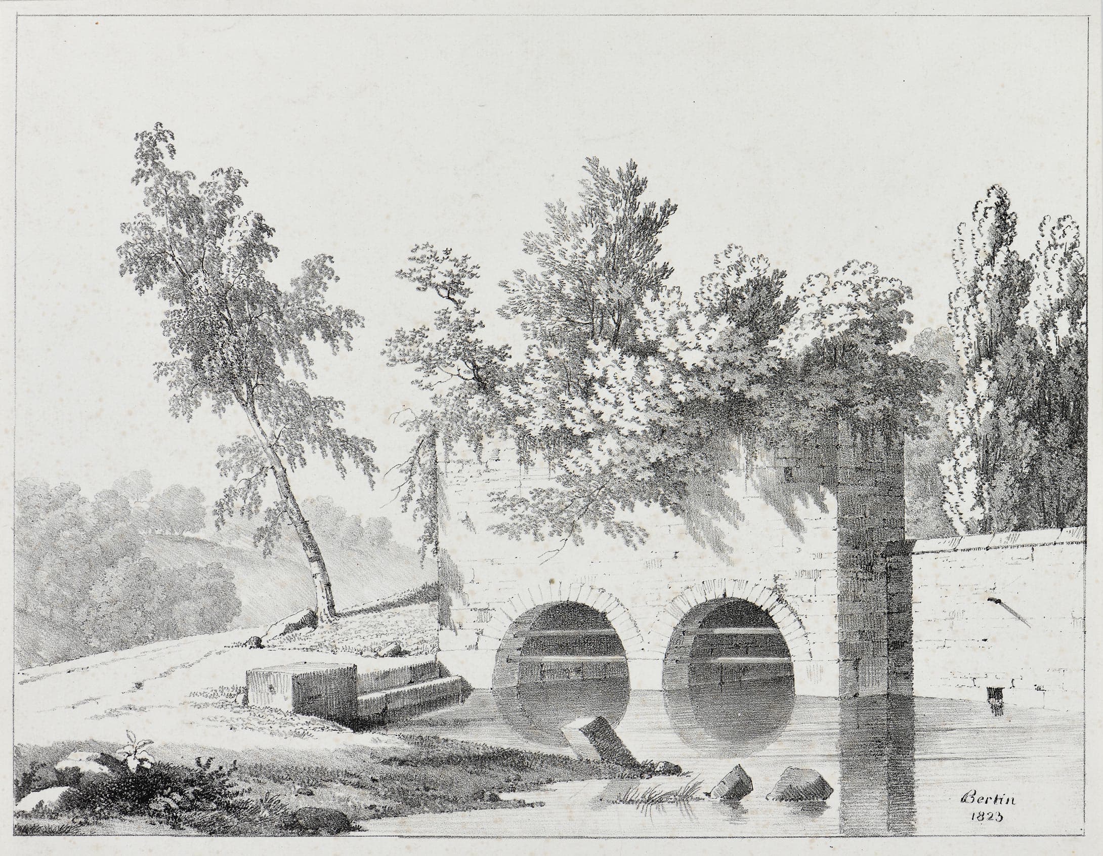 Groupe d’arbres entourant un pont à deux arches