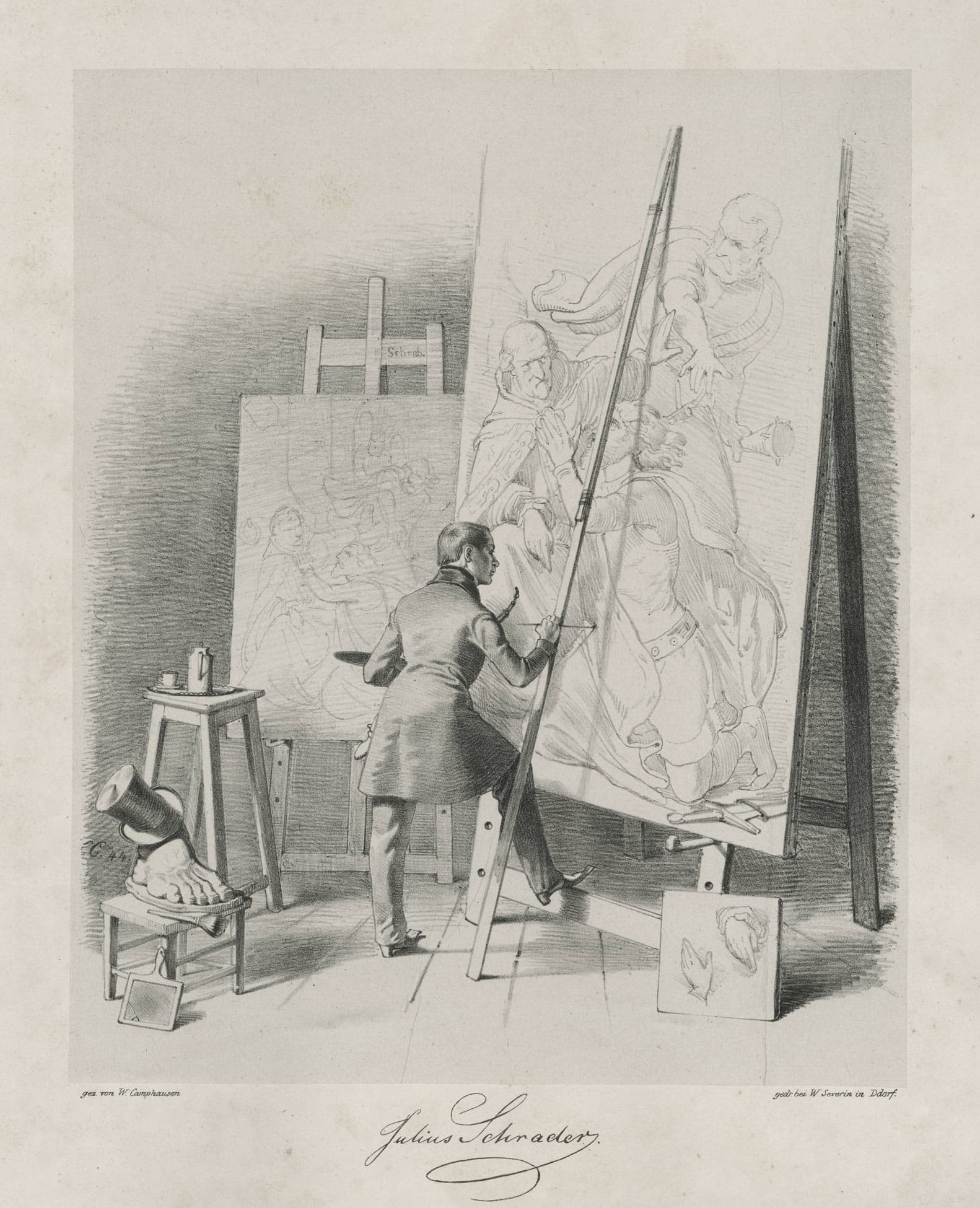 Julius Schrader standing in his studio painting a very large painting