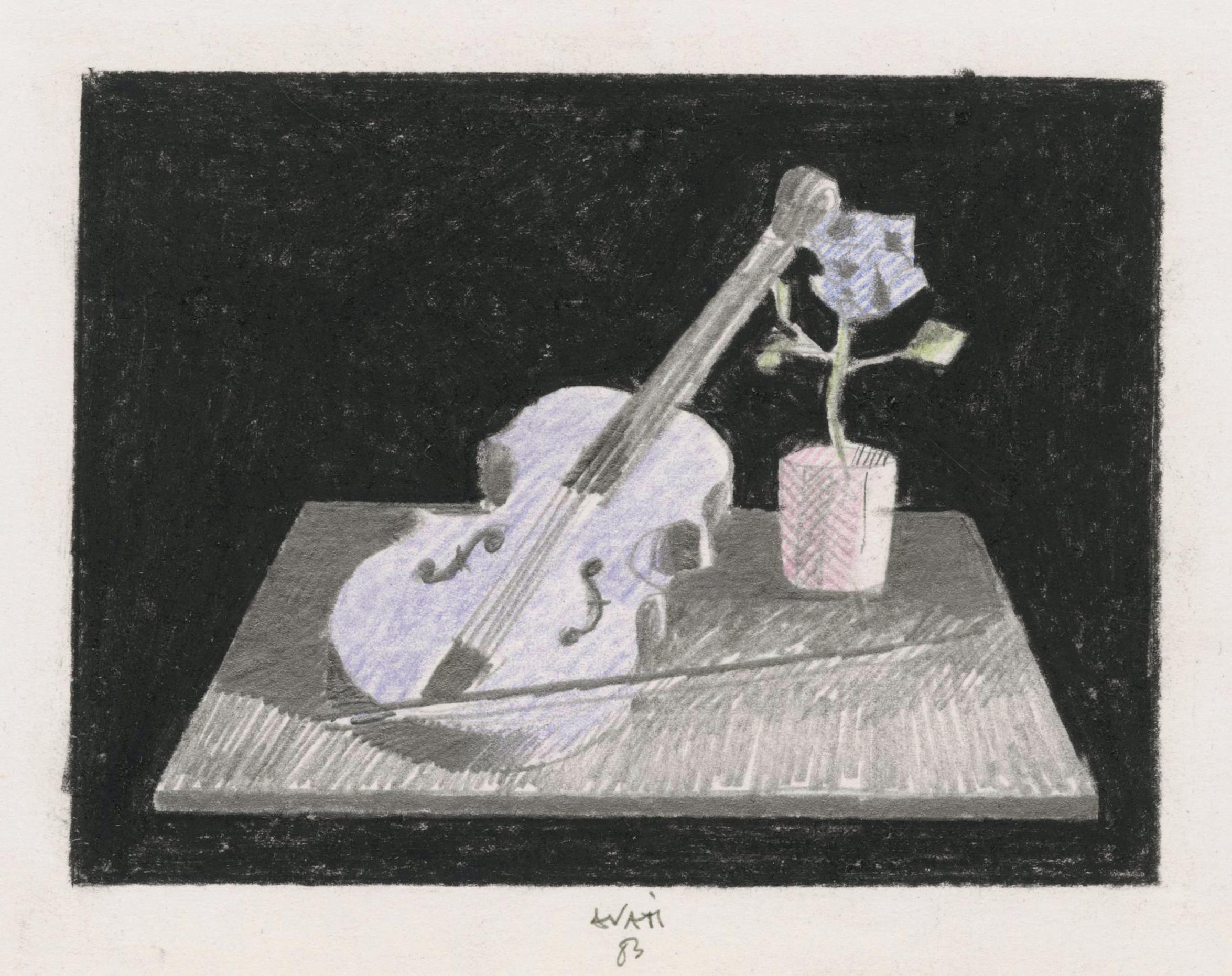 Violin and flower on a table