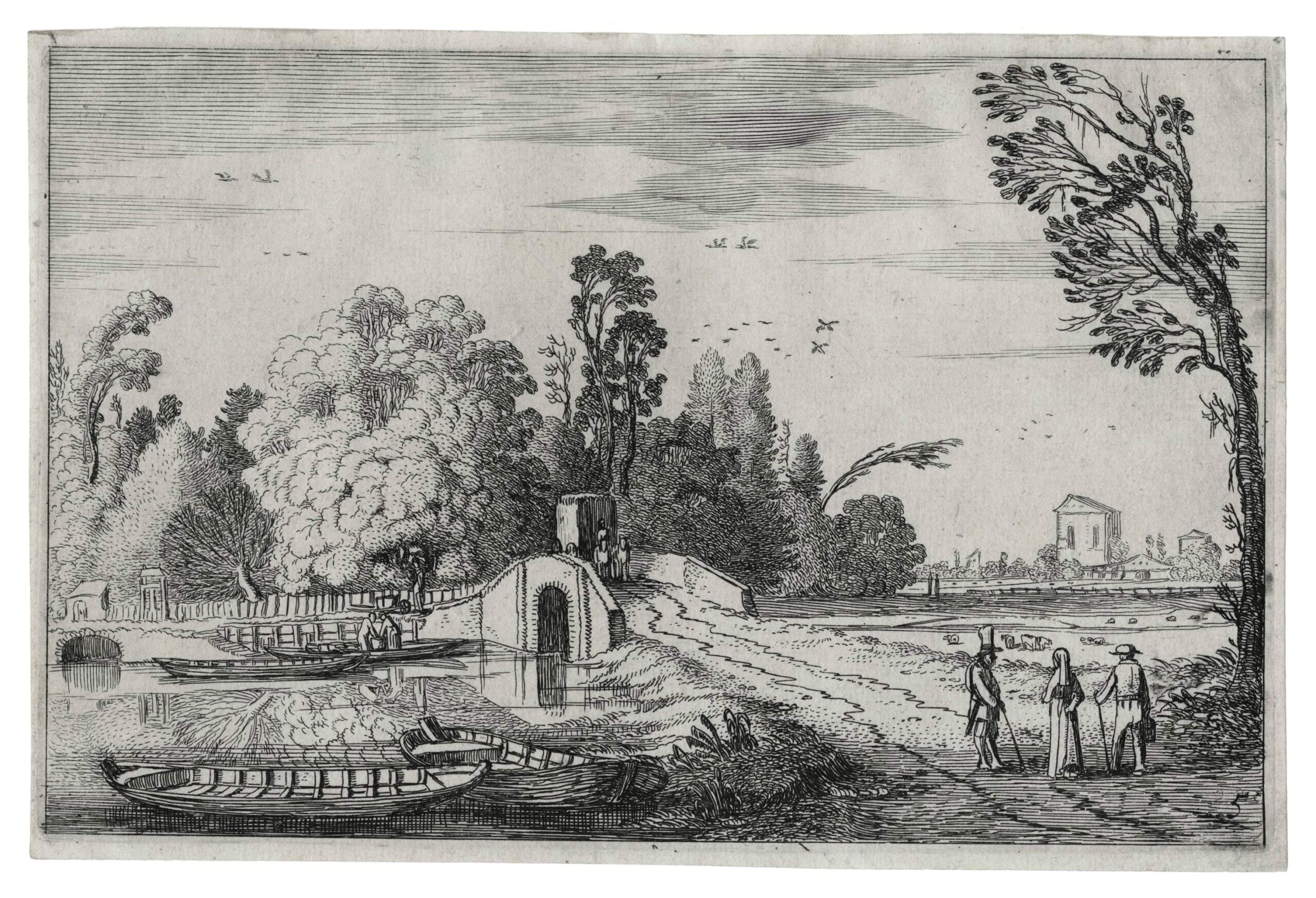 Route menant à un pont en pierre