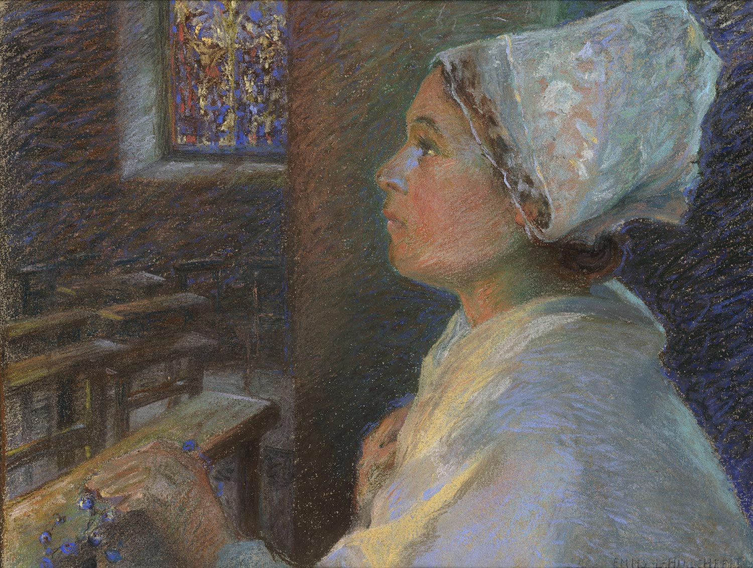 A Breton woman at prayer