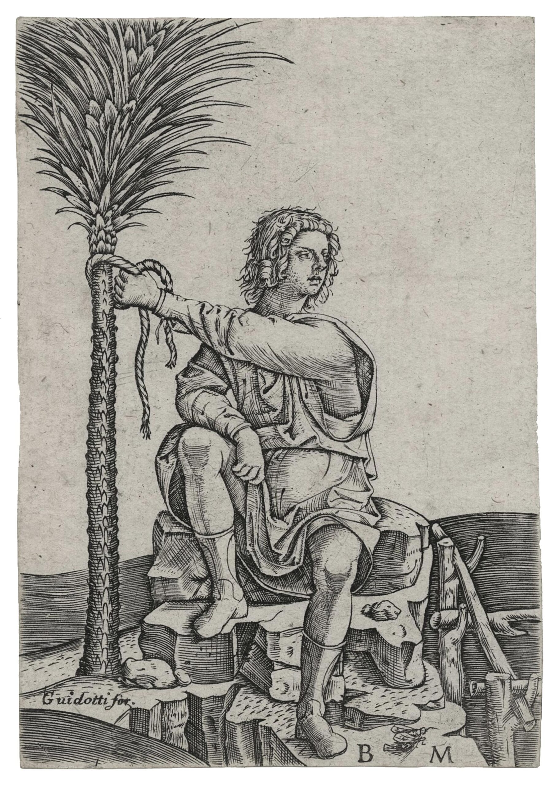 The man sitting by a palm tree