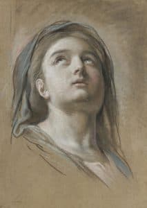 Tête de femme les yeux levés vers le ciel