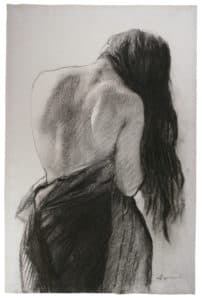 Dos nu d’une femme aux cheveux longs